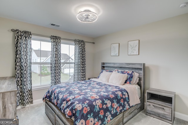 59 Michigan Cir, Hoschton, GA 30548 - bedroom featuring a decorative wall, visible vents, a crib, and baseboards