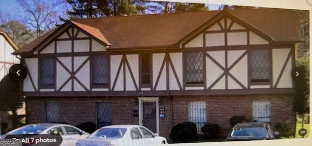 3231 Abbeywood Dr, Decatur, GA 30034 - tudor house with brick siding and stucco siding