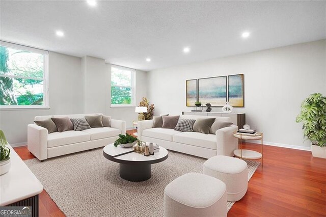 2965 Pharr Ct S Unit 110, Atlanta, GA 30305 - living room with recessed lighting, wood finished floors, and baseboards