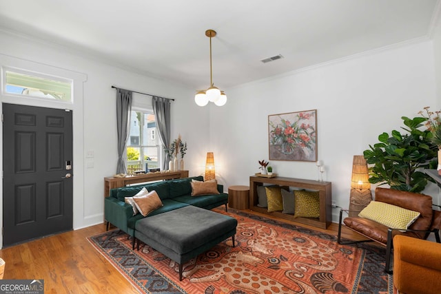 69 Hogue St NE, Atlanta, GA 30312 - living area featuring ornamental molding and wood finished floors