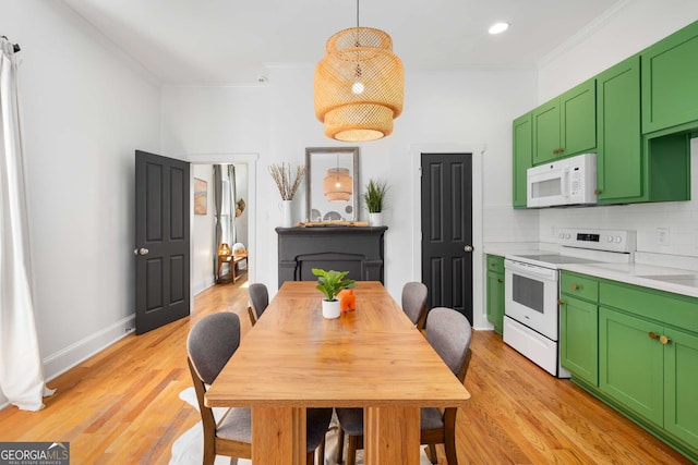 69 Hogue St NE, Atlanta, GA 30312 - dining room with ornamental molding, light wood-style floors, recessed lighting, and baseboards