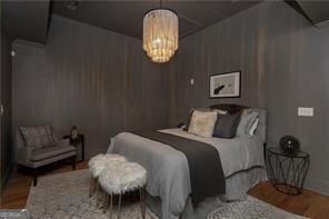69 Hogue St NE, Atlanta, GA 30312 - bedroom with wood finished floors and a chandelier