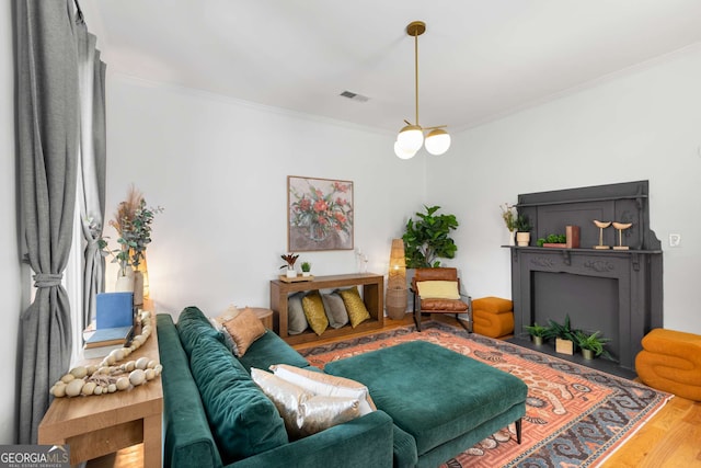 69 Hogue St NE, Atlanta, GA 30312 - living room featuring crown molding and wood finished floors