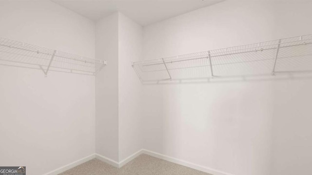 1416 Clear Pond Ln, Dacula, GA 30019 - spacious closet featuring light colored carpet