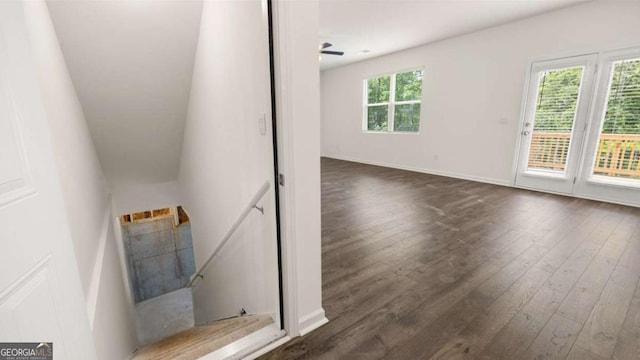 1416 Clear Pond Ln, Dacula, GA 30019 - staircase with wood-type flooring and baseboards