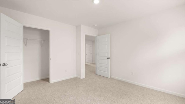1416 Clear Pond Ln, Dacula, GA 30019 - unfurnished bedroom featuring light carpet, baseboards, a closet, and recessed lighting