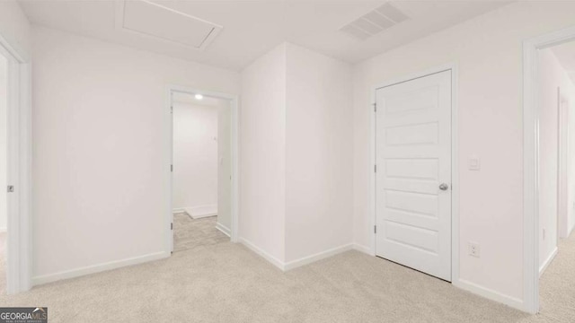 1416 Clear Pond Ln, Dacula, GA 30019 - unfurnished room with light carpet, baseboards, and attic access