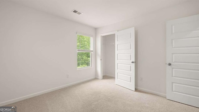1416 Clear Pond Ln, Dacula, GA 30019 - unfurnished bedroom featuring carpet floors, baseboards, and a closet