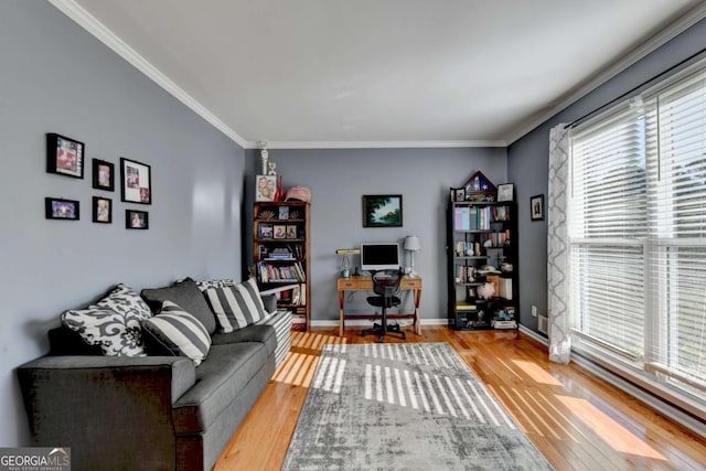 2820 Ashton Tree Ct, Dacula, GA 30019 - interior space featuring crown molding, baseboards, wood finished floors, and a healthy amount of sunlight