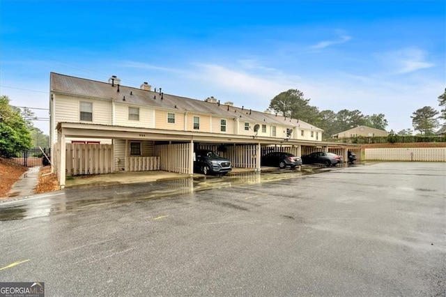 992 Old Holcomb Bridge Rd, Roswell, GA 30076 - covered parking lot with fence