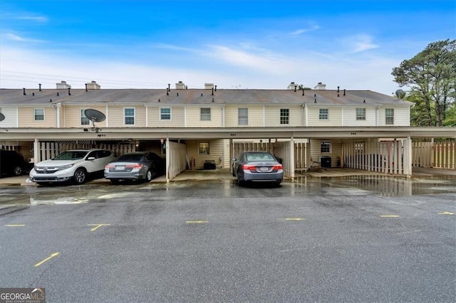 992 Old Holcomb Bridge Rd, Roswell, GA 30076 - exterior space featuring covered parking