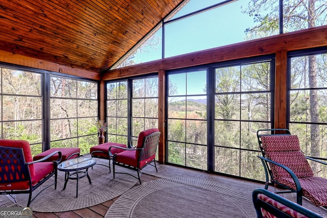 sunroom / solarium featuring high vaulted ceiling, a healthy amount of sunlight, outdoor lounge area, and wooden ceiling