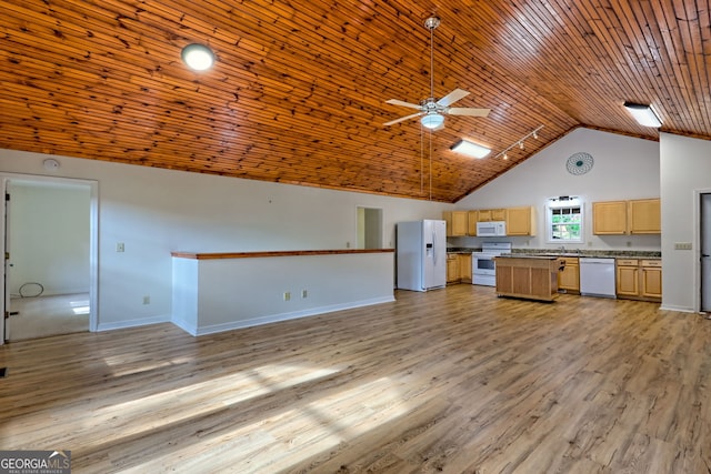kitchen with white appliances, open floor plan, high vaulted ceiling, a ceiling fan, and light wood finished floors