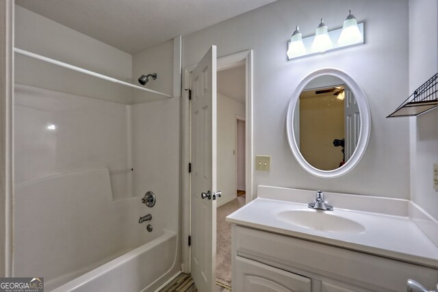 bathroom with  shower combination and vanity