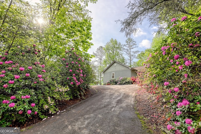 exterior space with aphalt driveway
