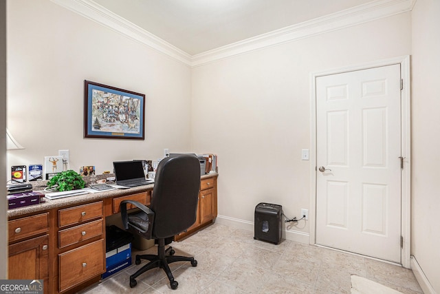 office space with crown molding, baseboards, and light tile patterned floors