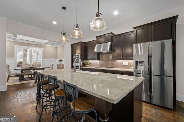 2601 Boulder Way, Woodstock, GA 30188 - kitchen featuring appliances with stainless steel finishes, under cabinet range hood, a sink, dark wood-style flooring, and a spacious island