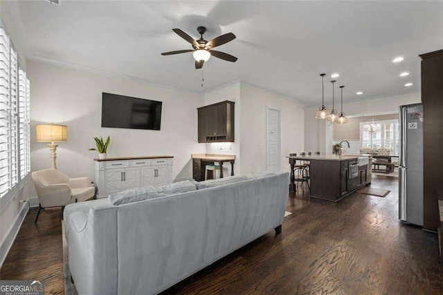 2601 Boulder Way, Woodstock, GA 30188 - living room with ceiling fan, dark wood finished floors, ornamental molding, baseboards, and recessed lighting
