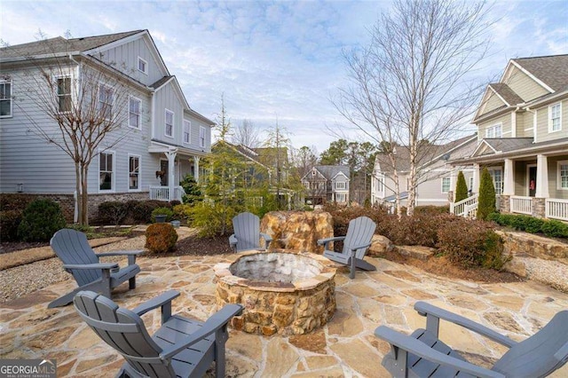 2601 Boulder Way, Woodstock, GA 30188 - view of patio / terrace with a fire pit and a residential view