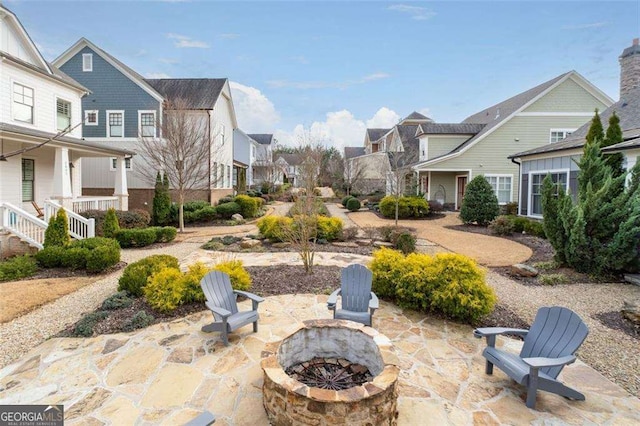 2601 Boulder Way, Woodstock, GA 30188 - view of patio with an outdoor fire pit and a residential view