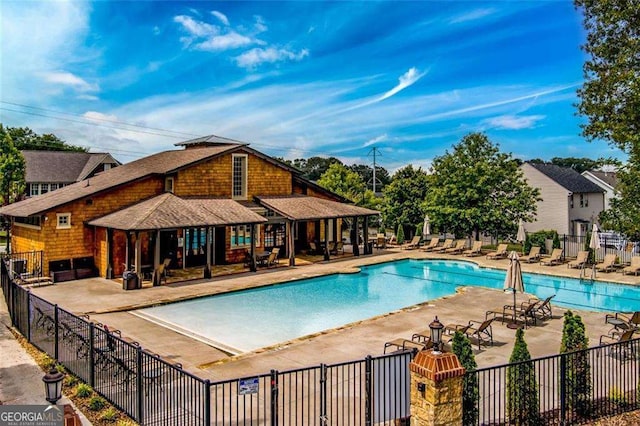 2601 Boulder Way, Woodstock, GA 30188 - community pool with a patio area and fence