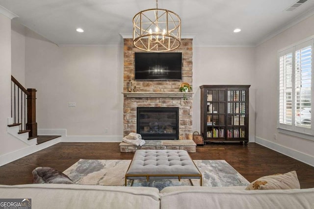 2601 Boulder Way, Woodstock, GA 30188 - living room featuring ornamental molding, a chandelier, wood finished floors, baseboards, and stairs