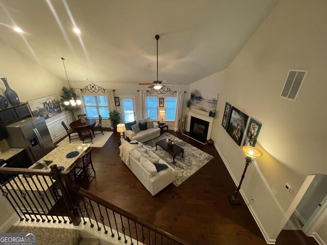 3708 Southfield Ct Unit 43A, Loganville, GA 30052 - living area with dark wood-style flooring, a fireplace, and a ceiling fan