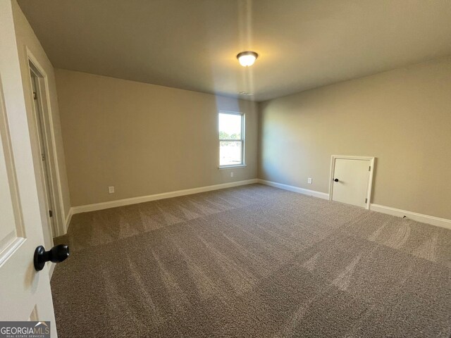 3708 Southfield Ct Unit 43A, Loganville, GA 30052 - unfurnished room featuring carpet flooring and baseboards