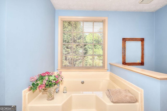 3740 Laurel Brook Way, Snellville, GA 30039 - full bath featuring healthy amount of natural light, a bath, and a textured ceiling