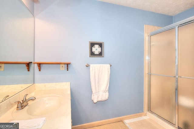 3740 Laurel Brook Way, Snellville, GA 30039 - bathroom featuring a shower with door, vanity, and baseboards