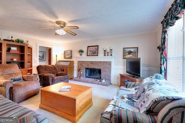3740 Laurel Brook Way, Snellville, GA 30039 - living area featuring ceiling fan, light colored carpet, ornamental molding, a wainscoted wall, and a fireplace
