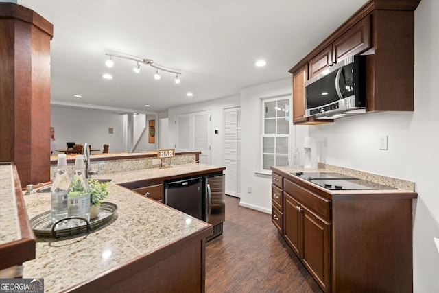 kitchen featuring stainless steel microwave, dark wood-style flooring, recessed lighting, black electric stovetop, and dark brown cabinets