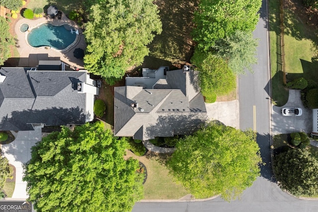 drone / aerial view of a pool