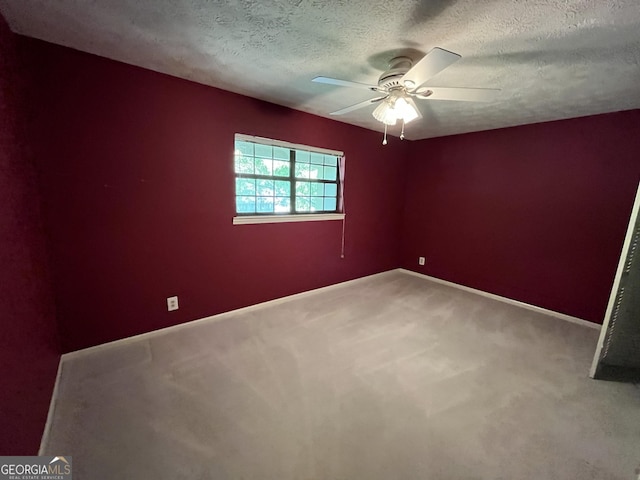 120 Treeside Dr NW, Rome, GA 30165 - unfurnished room featuring ceiling fan, baseboards, a textured ceiling, and carpet