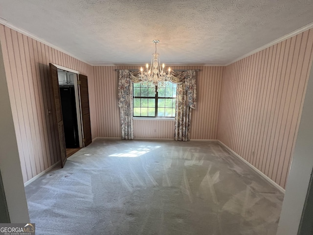 120 Treeside Dr NW, Rome, GA 30165 - unfurnished dining area with carpet flooring, a textured ceiling, crown molding, and a notable chandelier