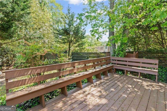deck featuring fence