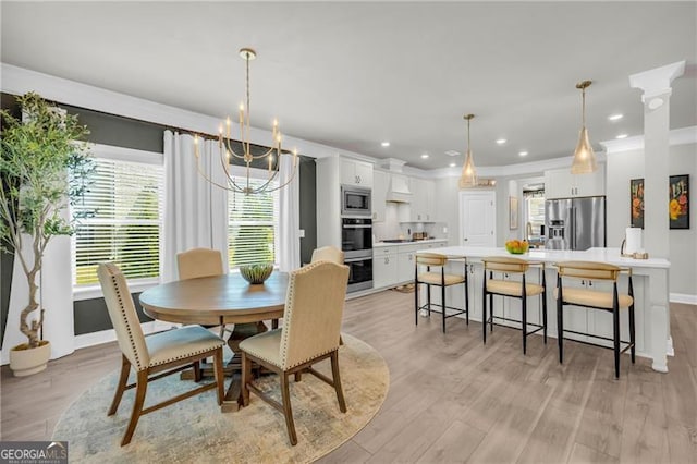 5003 Fairview Cir, Villa Rica, GA 30180 - dining room with light wood-type flooring, baseboards, recessed lighting, a notable chandelier, and ornamental molding