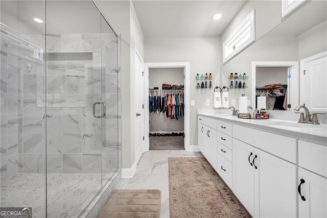 5003 Fairview Cir, Villa Rica, GA 30180 - bathroom featuring a shower stall, marble finish floor, a sink, and double vanity