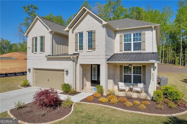 5003 Fairview Cir, Villa Rica, GA 30180 - traditional-style house featuring a front lawn, driveway, covered porch, brick siding, and a garage