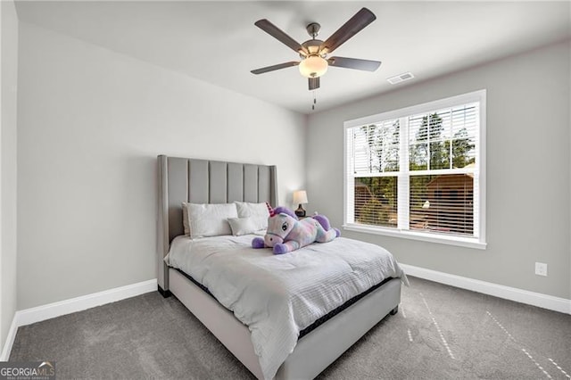 5003 Fairview Cir, Villa Rica, GA 30180 - bedroom featuring baseboards, visible vents, carpet flooring, and ceiling fan