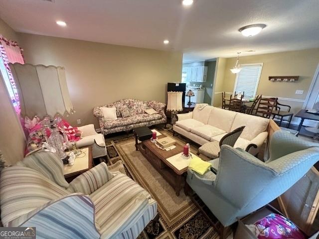 living room featuring recessed lighting
