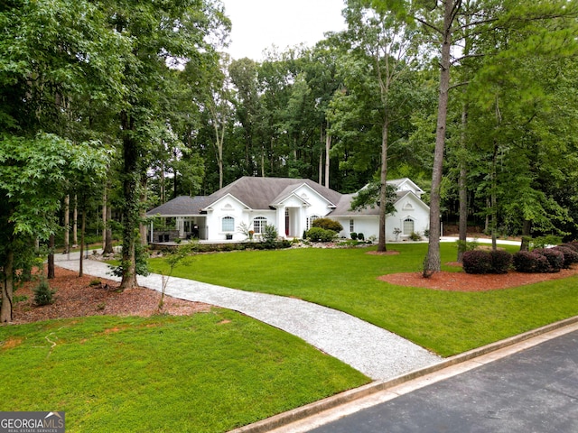 135 Adams Park Dr, Fayetteville, GA 30214 - ranch-style house featuring a front yard and driveway