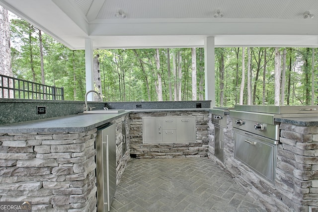 135 Adams Park Dr, Fayetteville, GA 30214 - view of patio / terrace with area for grilling and a sink