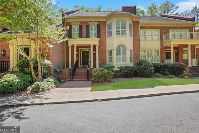 1020 Riverside Rd, Roswell, GA 30076 - view of front facade featuring a chimney and brick siding