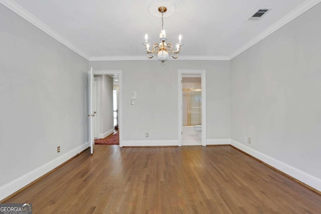 1020 Riverside Rd, Roswell, GA 30076 - unfurnished room featuring wood finished floors, visible vents, a chandelier, and baseboards