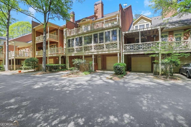1020 Riverside Rd, Roswell, GA 30076 - view of property featuring a garage