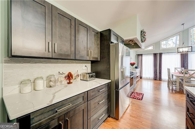 70 Denny Ridge Rd, Jasper, GA 30143 - kitchen featuring light wood-type flooring, stainless steel refrigerator with ice dispenser, dark brown cabinetry, and tasteful backsplash