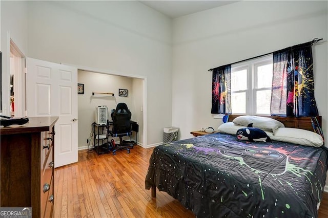 70 Denny Ridge Rd, Jasper, GA 30143 - bedroom with a high ceiling, light wood finished floors, and baseboards