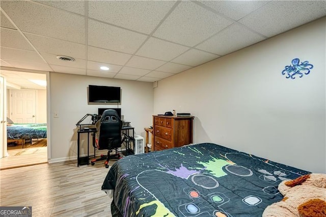 70 Denny Ridge Rd, Jasper, GA 30143 - bedroom featuring wood finished floors, visible vents, and a drop ceiling