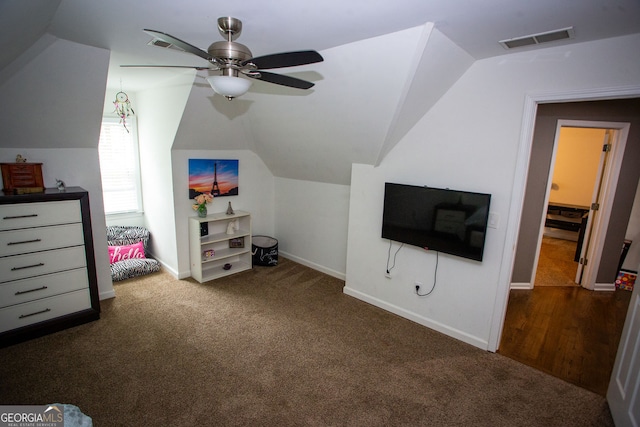 6147 Pritchett Dr, Powder Springs, GA 30127 - carpeted bedroom featuring vaulted ceiling, baseboards, and a ceiling fan